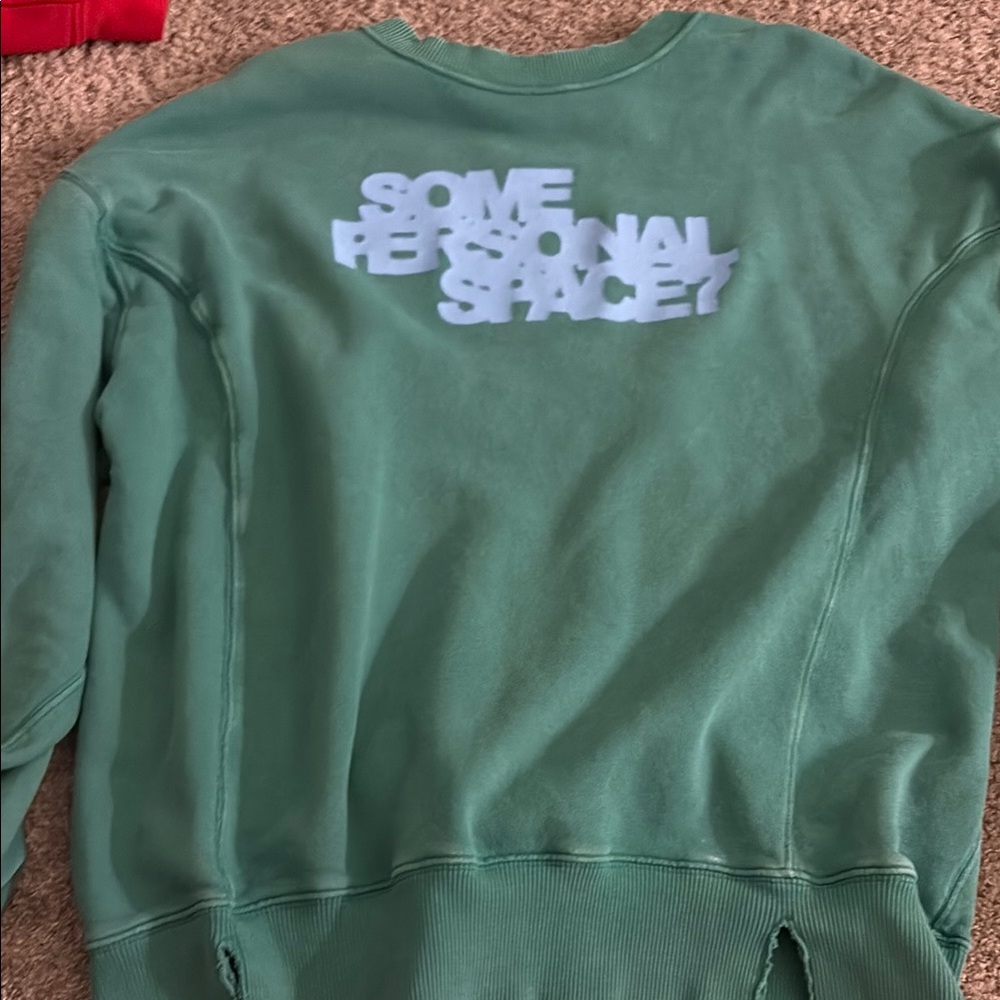 Green Sweater with rips